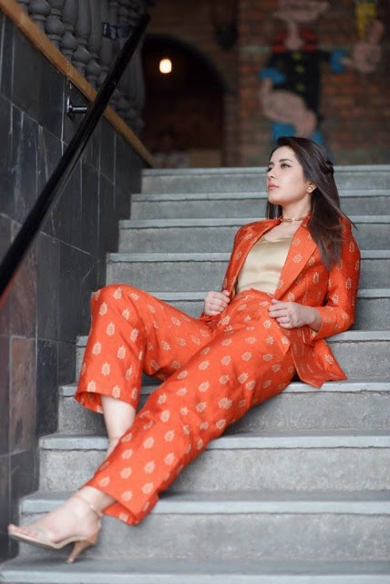 Raashi Khanna latest Photo Shoot In Long Hair Orange Dress 16